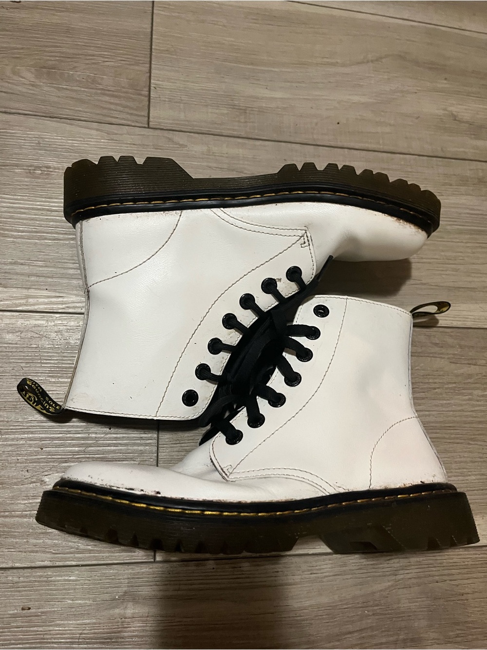 White Dr. Martens Lace-Up Combat Boots with Black Laces